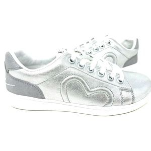 Adorable Ellen Degeneres silver sneakers